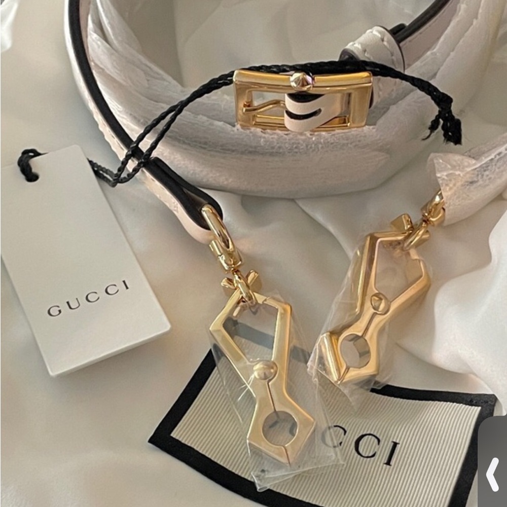Gucci Ivory strap with Gold Hardware